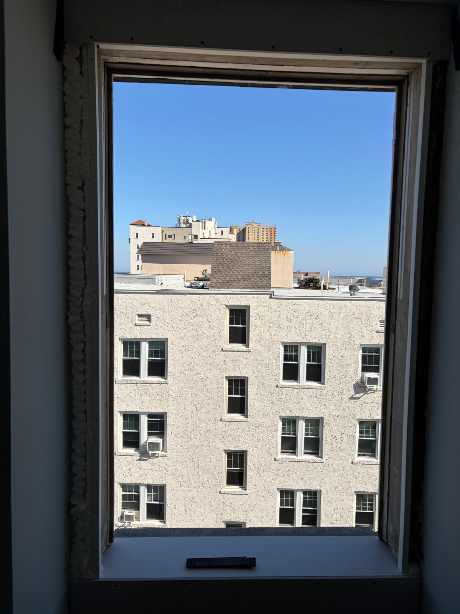 The window opening during preparation of the interior edges and sill.