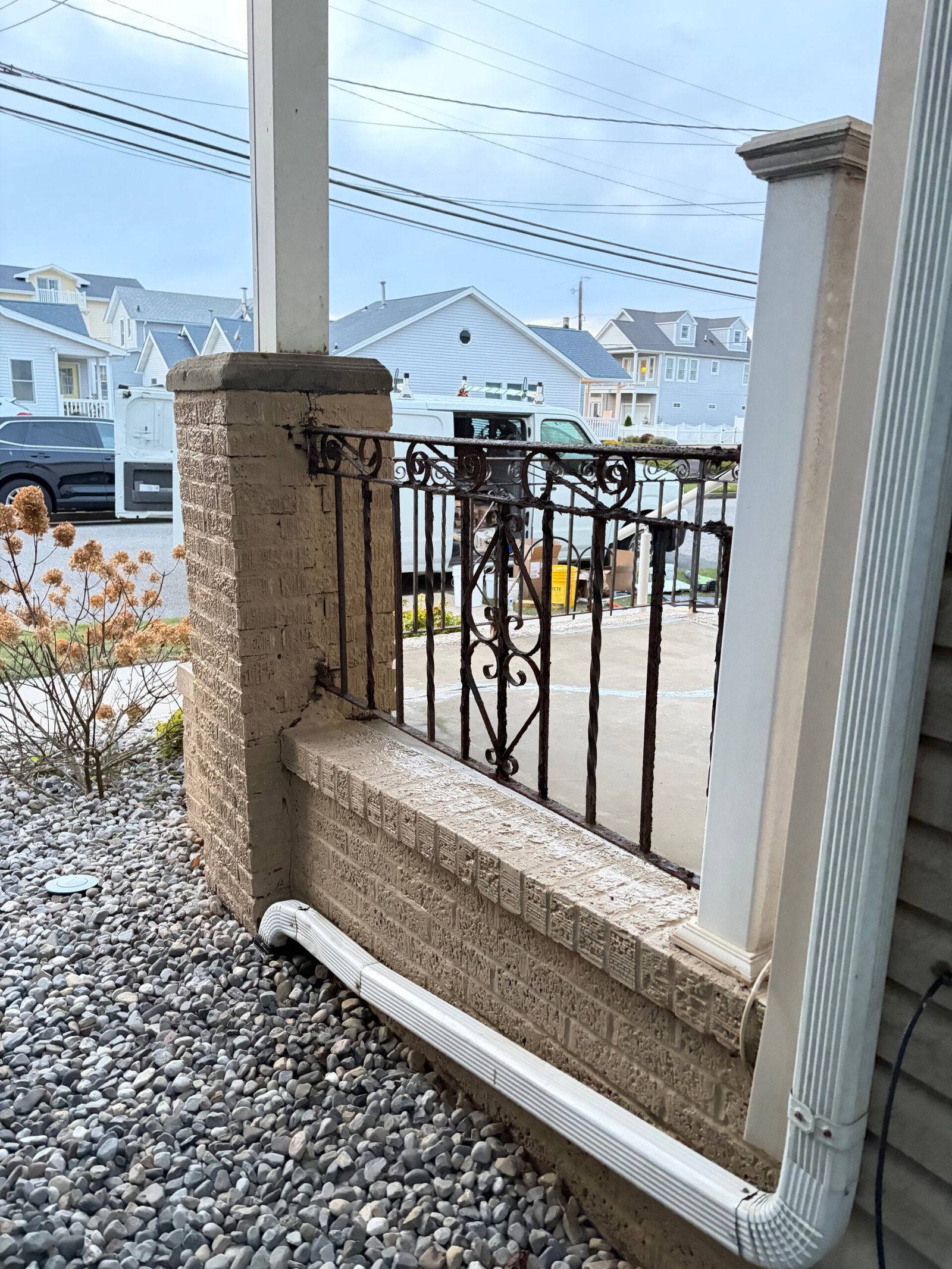 After: a closer view of the finished porch pier, base wall and decorative railing.