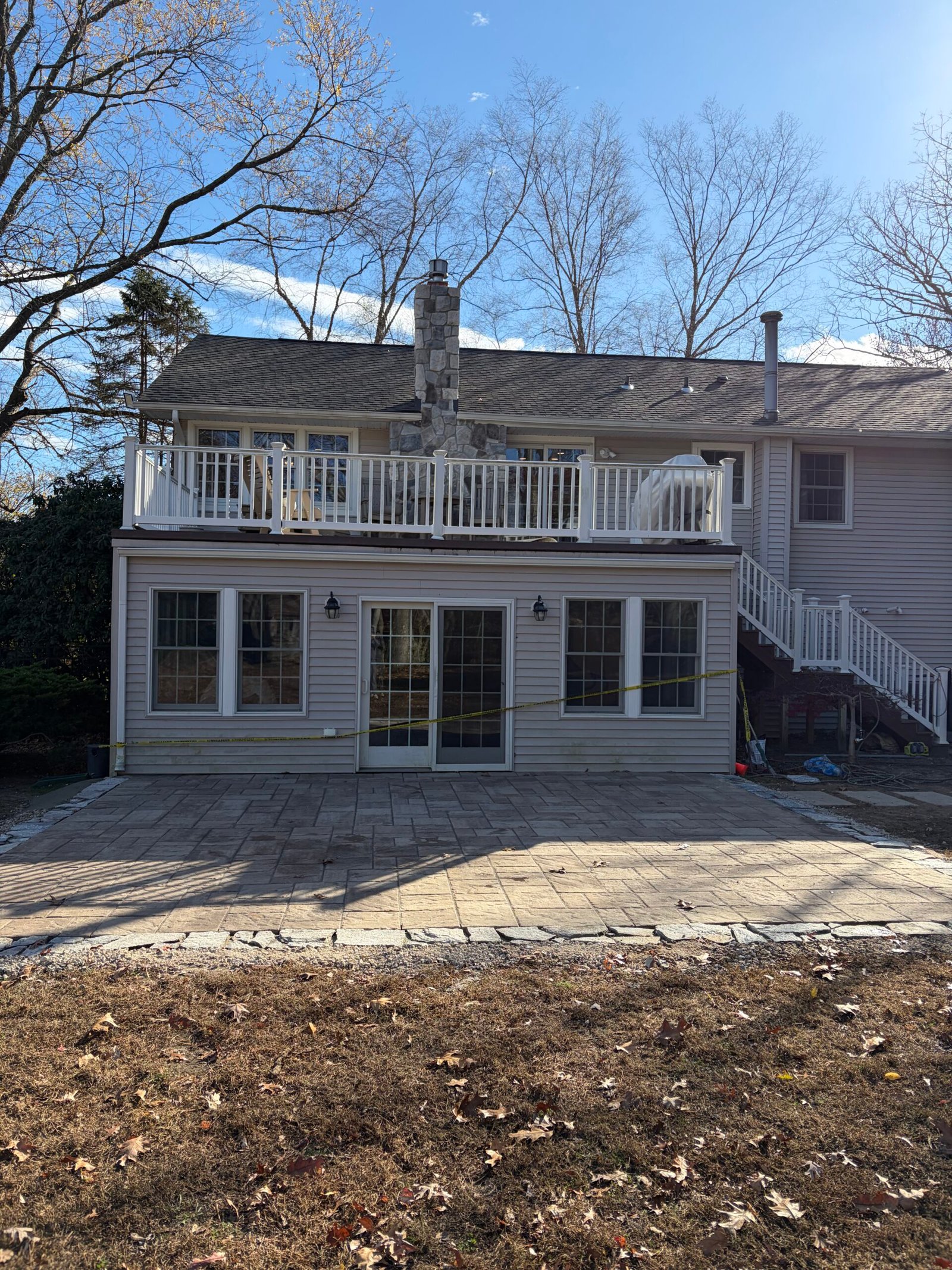 The stone border defining the front edge of the patio.