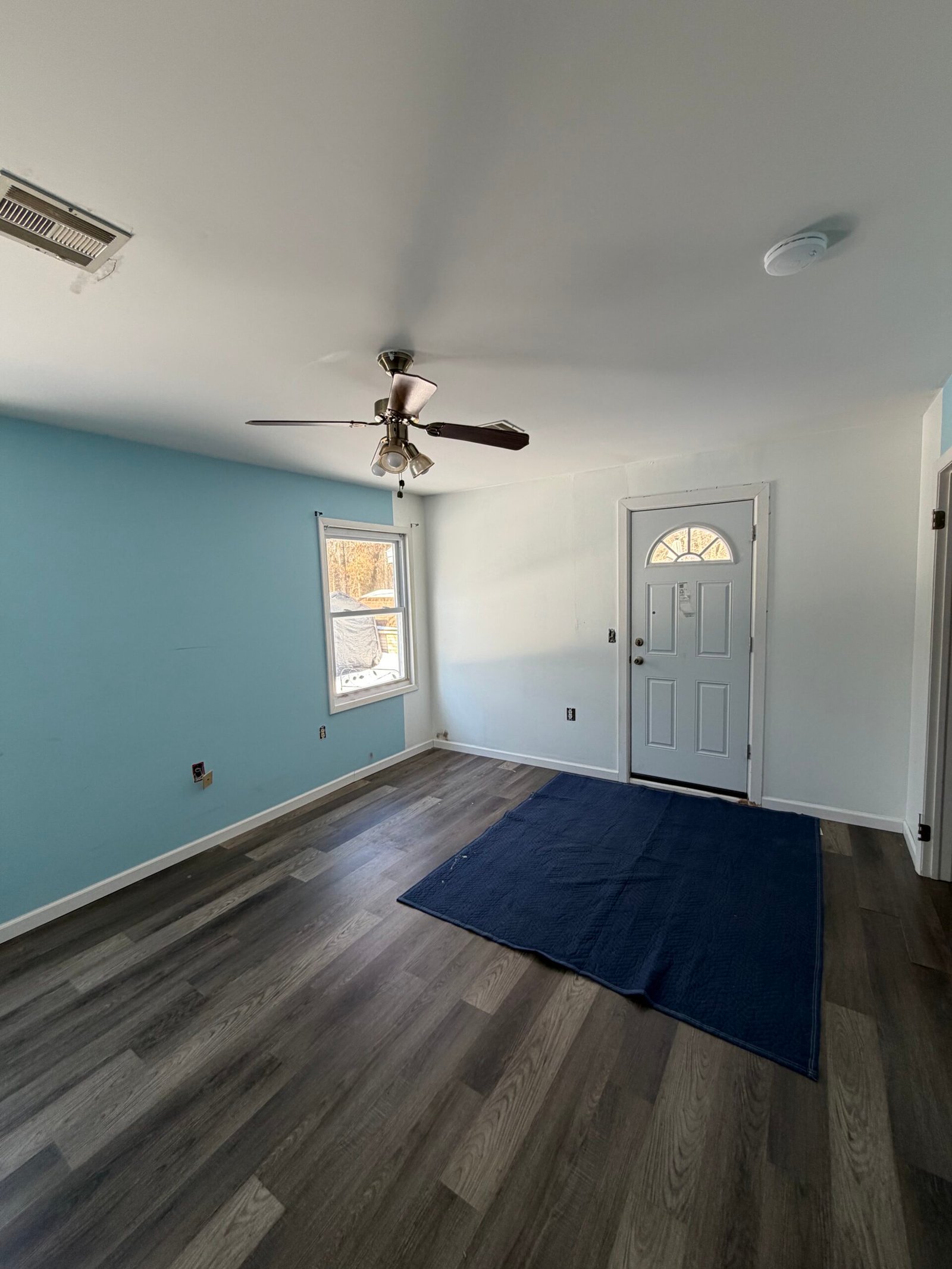 Before: the original room without the new recessed ceiling lights.