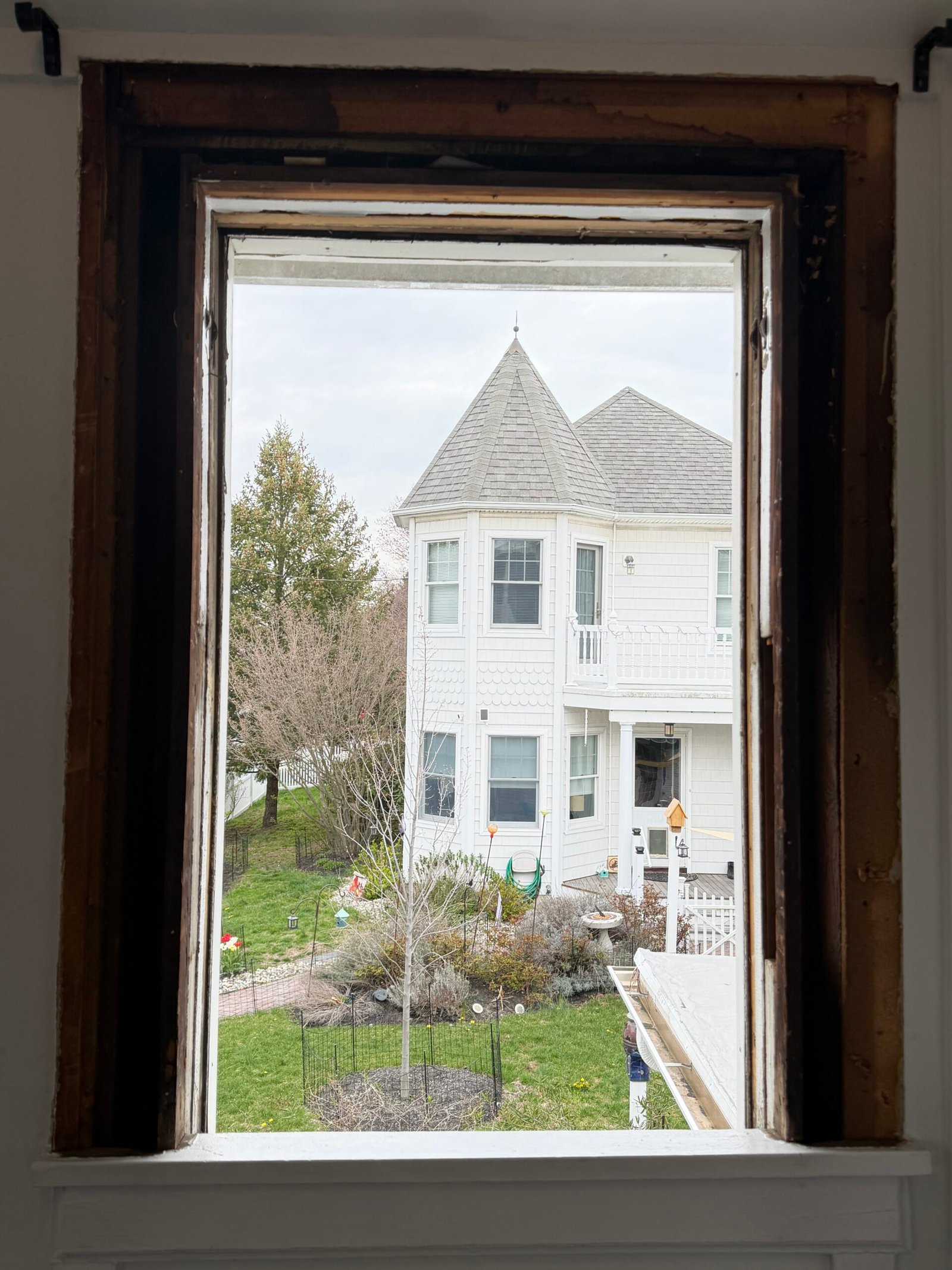 A single window opening exposed after removal of the old unit.