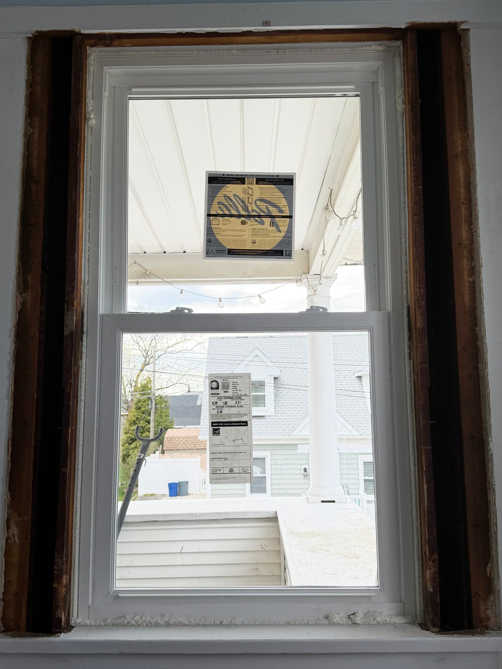 A single replacement window installed within the exposed timber opening.