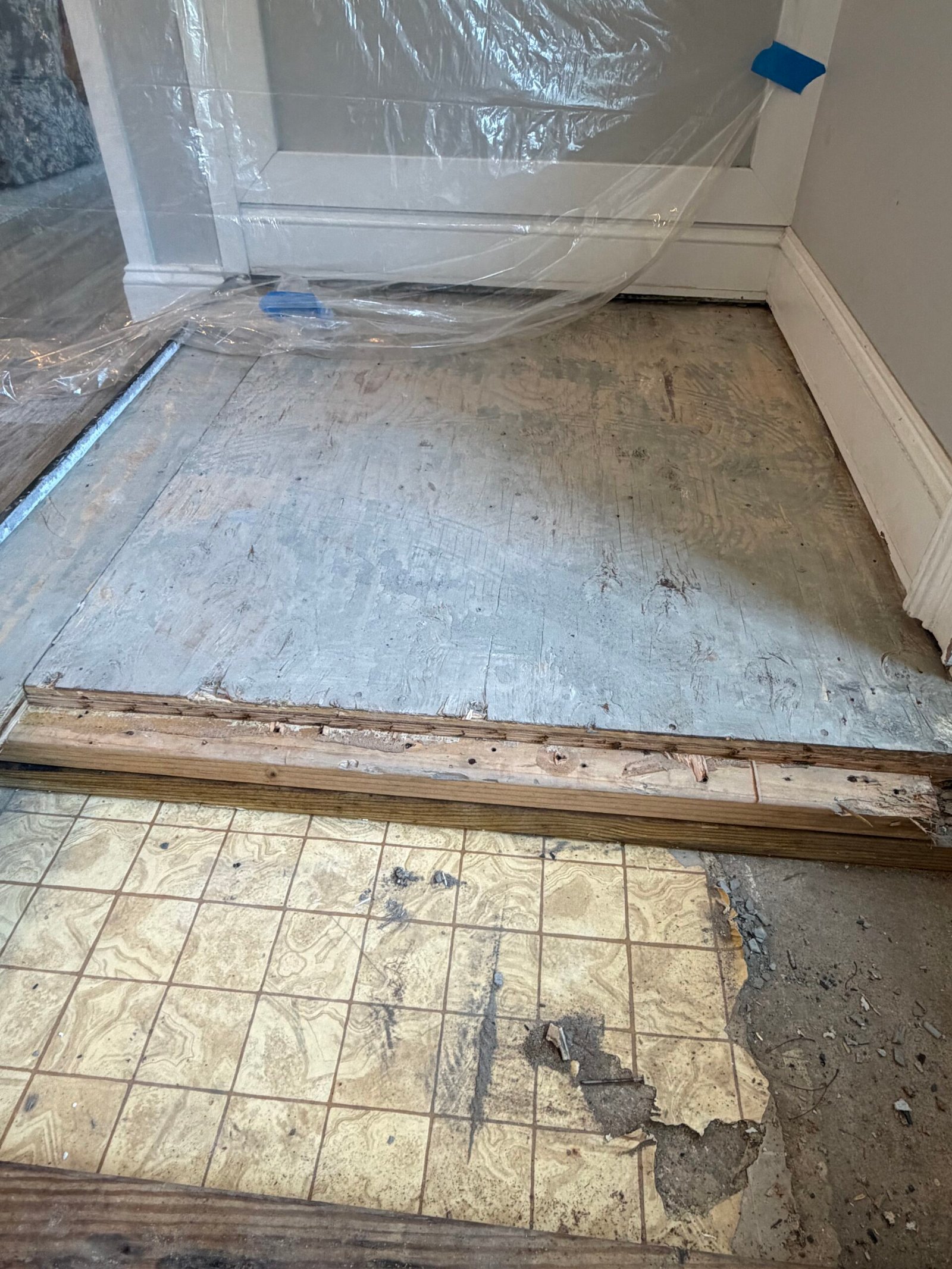 The side floor area and protective covering before the base was filled.