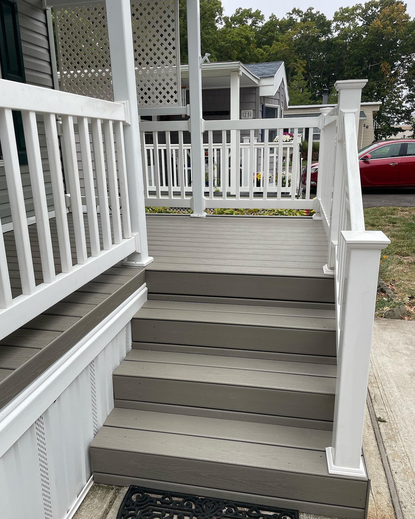 After: the front entrance steps and landing finished with gray TREX boards.